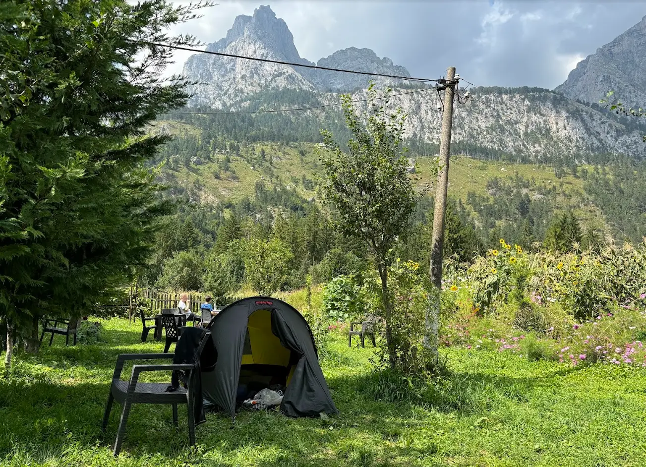 Tent pitched in guest house garden Tent pitched in the garden of the Dedushi Guest House in Valbona